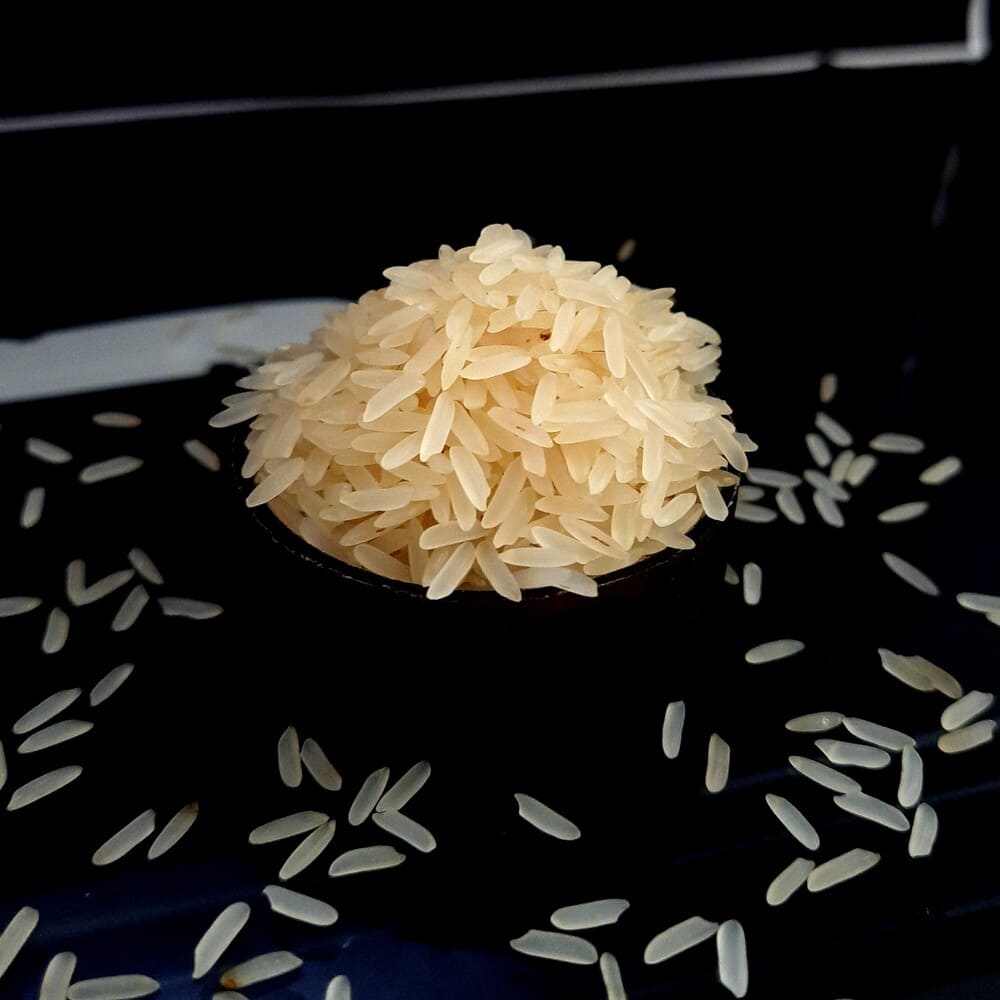 PR-11/ 14 Golden Sella Rice in a black bowl