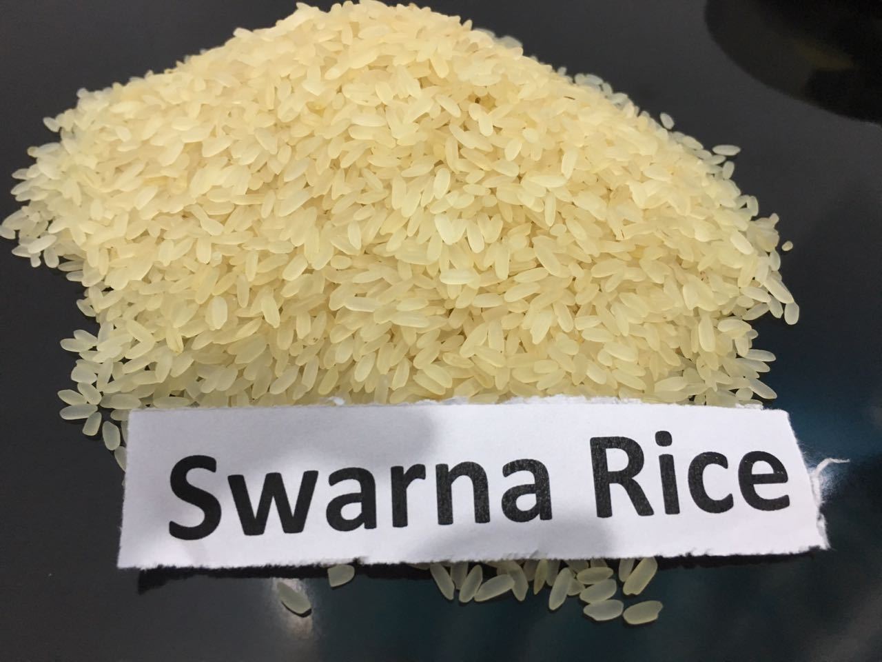 Swarna Sella Rice in a black bowl